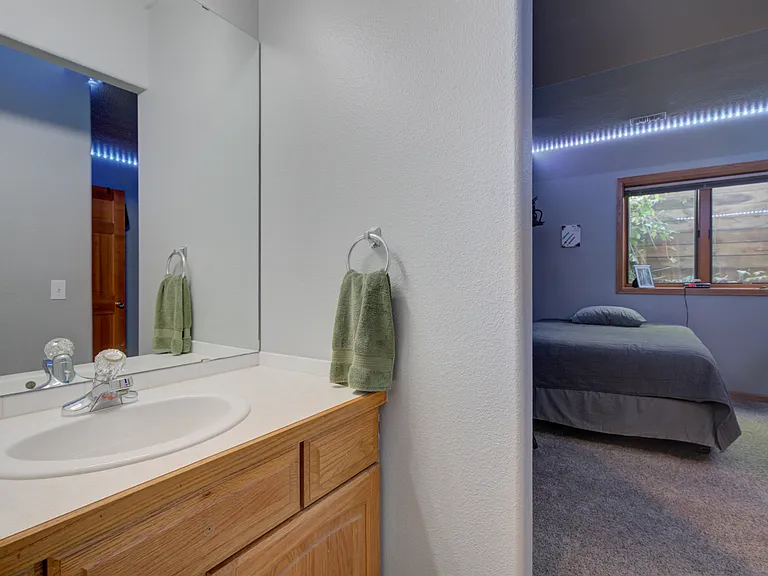 Jack and Jill bathroom connects third and fourth bedroom.