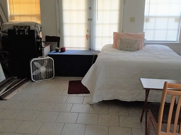 Expanded north wall view, some construction materials on left that will be removed