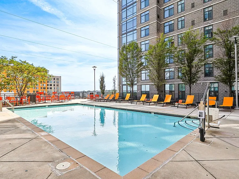 the swimming pool and deck chairs