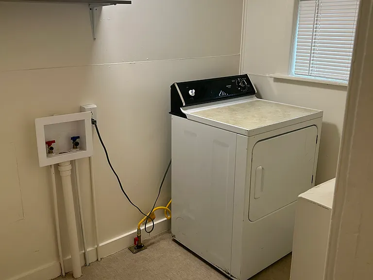 Laundry room. We provide gas dryer!!