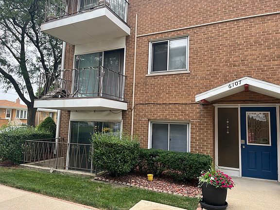 2nd image of 6107 W 64th Pl #1