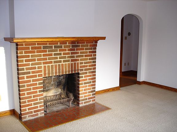 Family/Living room with brick fireplace