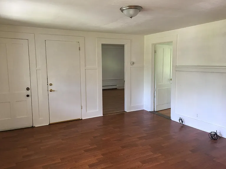 Living room. The open door on the left is the master bedroom and the open door on the right is the second bedroom.