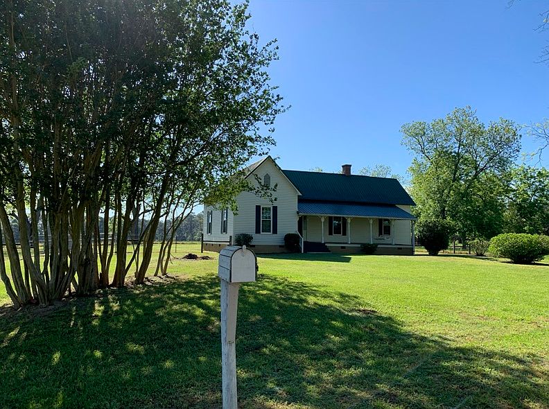 FRONT YARD AND HOUSE