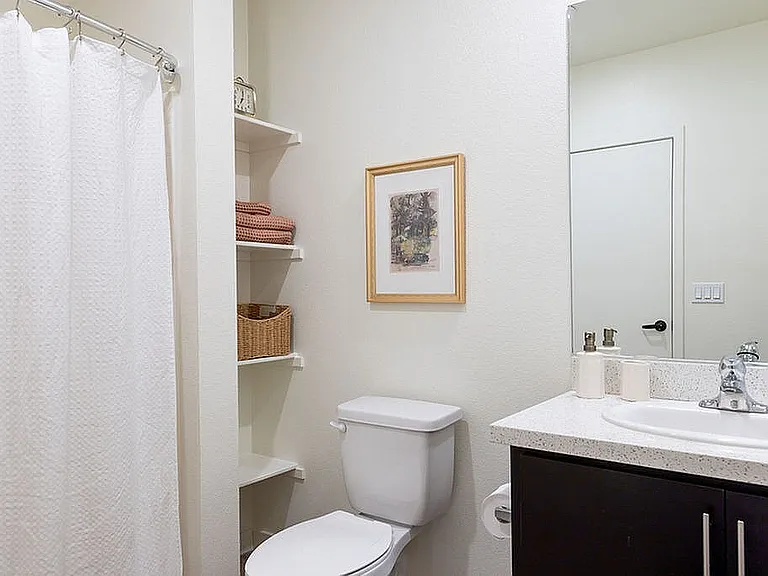 Crisp Bathroom With Storage