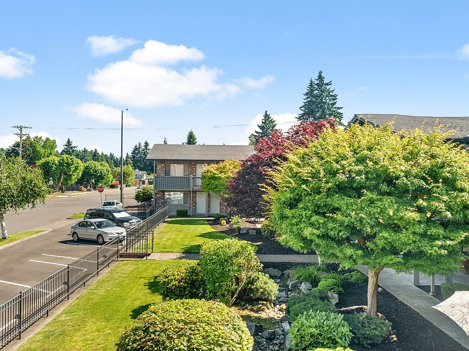 Well-maintained landscaping and convenient street parking for residents and guests.