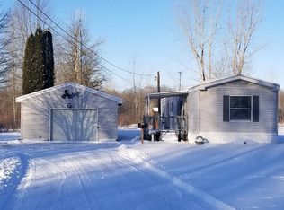 1255 N Nine Mile Rd, Sanford, MI 48657