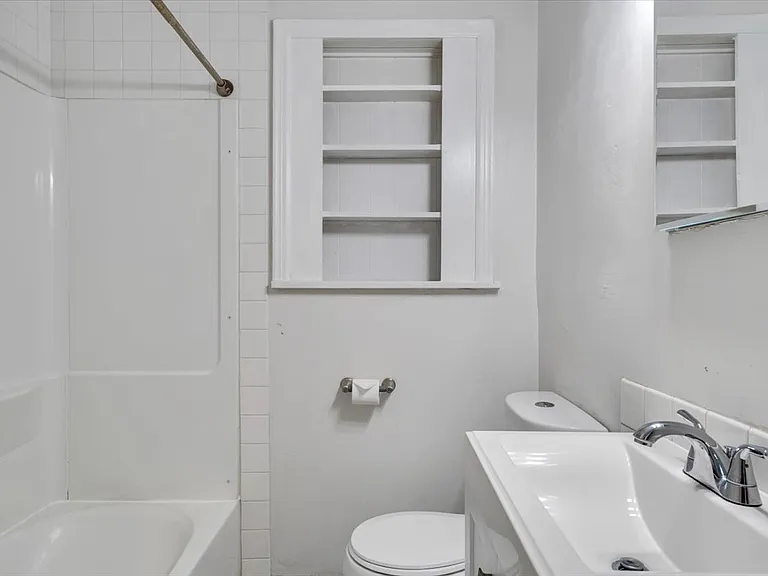 Bath w/ Tub/Shower, New Designer Vanity, Glass on Glass Vanity Mirror, Chair Height, Dual Flush Toilet and Built-In Cabinet.