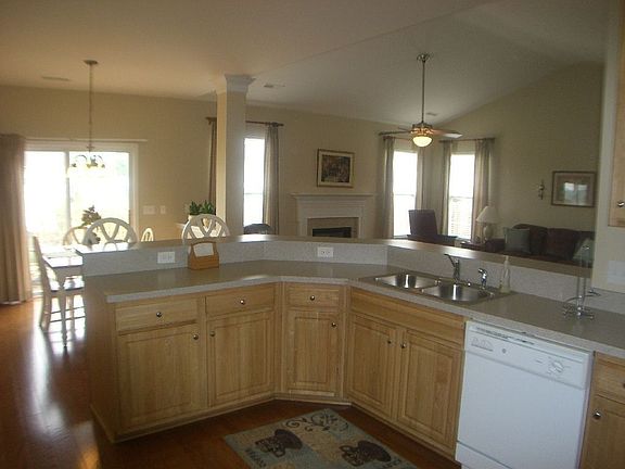 Open kitchen*hardwood*built-in microwave*refrigerator