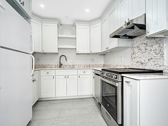 Renovated kitchen... new stove and dishwasher