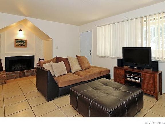 Living Area with Wood Burning Fireplace