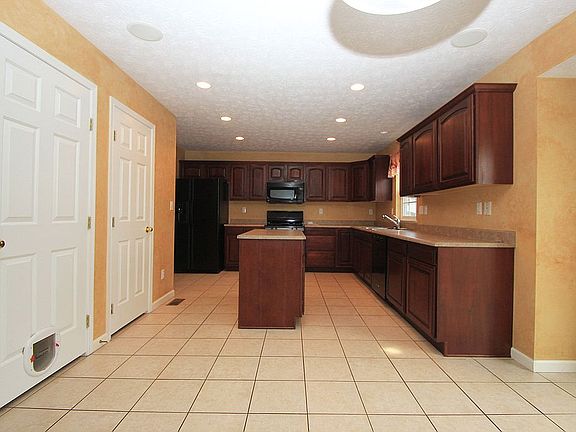 Alternate view of kitchen. Plenty of room for a table and chairs
