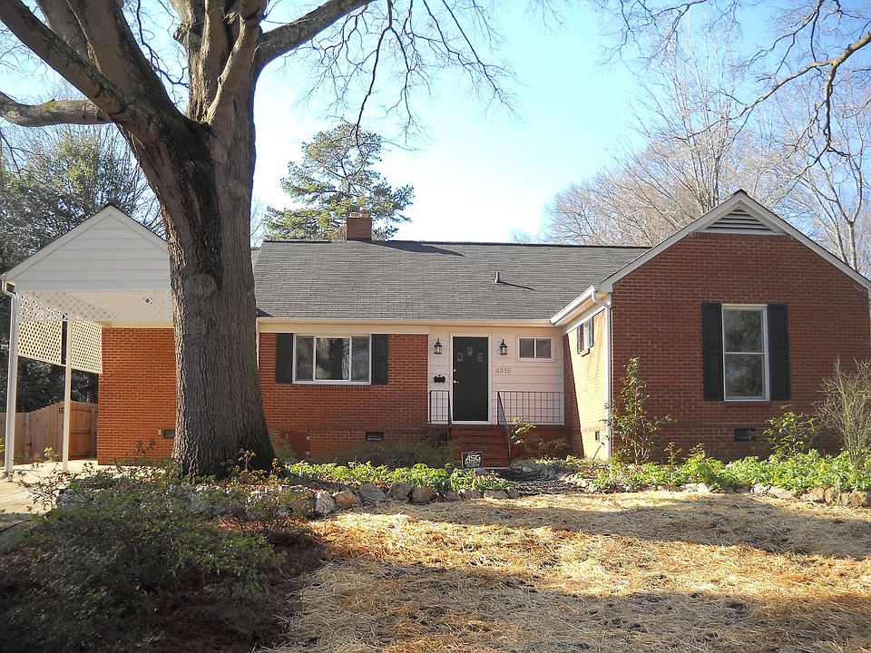 Handsome brick ranch with vinyl trim and dual pane, tilt-in windows