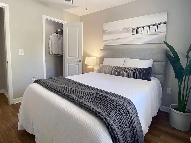 Stay organized with large walk-in closets, featuring customized shelving for an efficient and stylish storage solution.