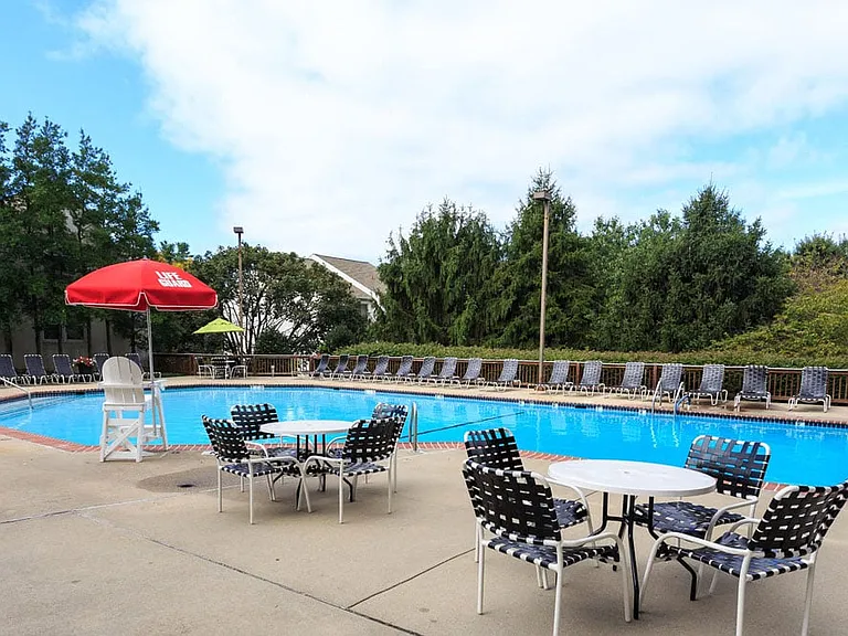 Swimming Pool with 2-Tier Sundeck and Gas Grills