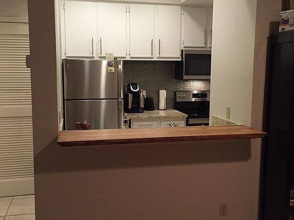 Bar opens to living room