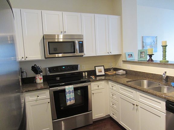 Open kitchen with stainless shell appliance