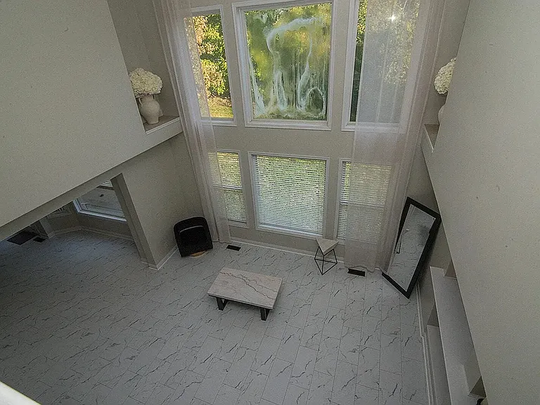 Main living room (Large window has been replaced with new one and no stain is visible)