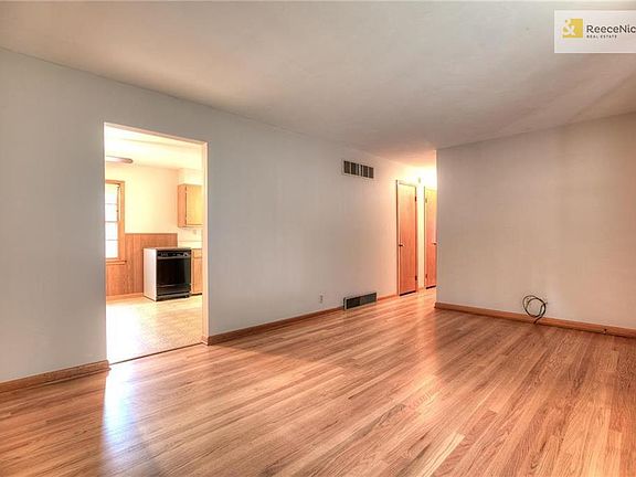 Living room looking into dining area
