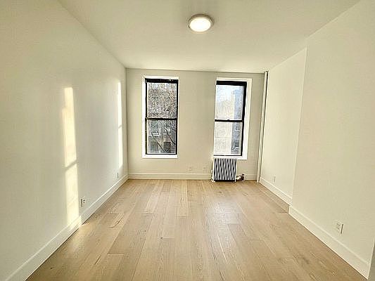 3rd image of 233 E 5th St APT 8