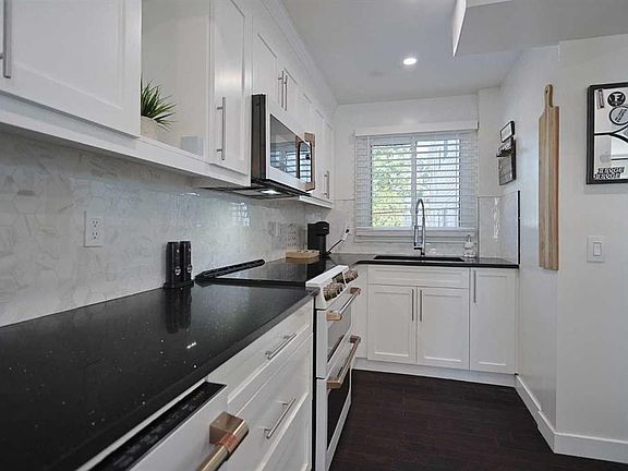 2nd image of 310 N Falconridge Cres NE #205
