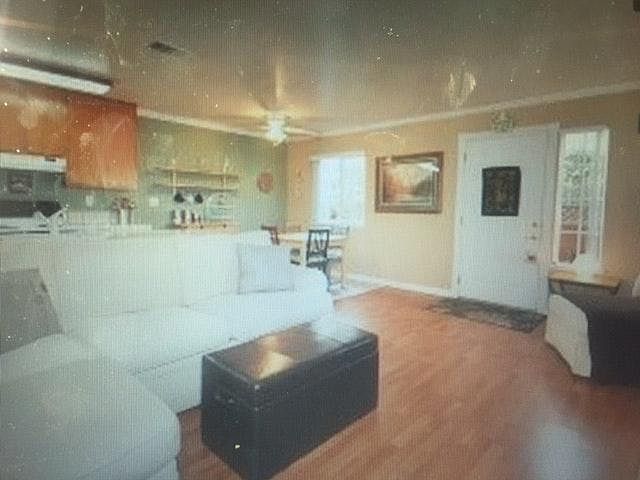 Comfortable family room near kitchen and bathroom.