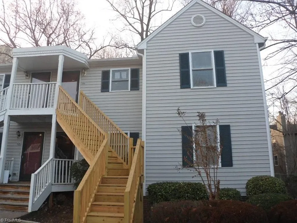 Front view, upstairs right end unit. Brand new stairway.