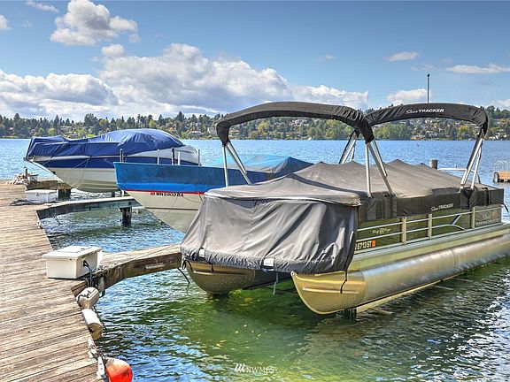 Close-up view of the dock and boat slip.  The Sun Tracker boat is for sale!>