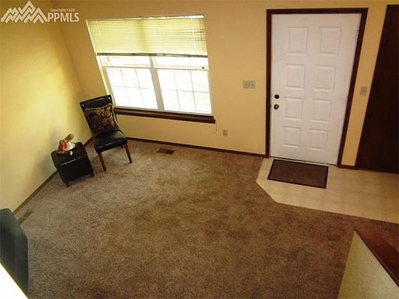 Living Room & Entry as seen from top of stairs