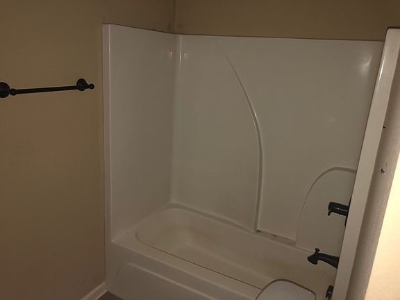 Bathtub in one of the bedrooms