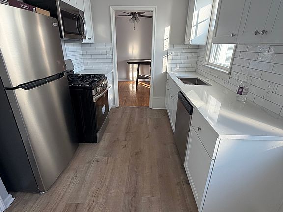New Kitchen, quartz counters, new appliances, flooring, cabinets.