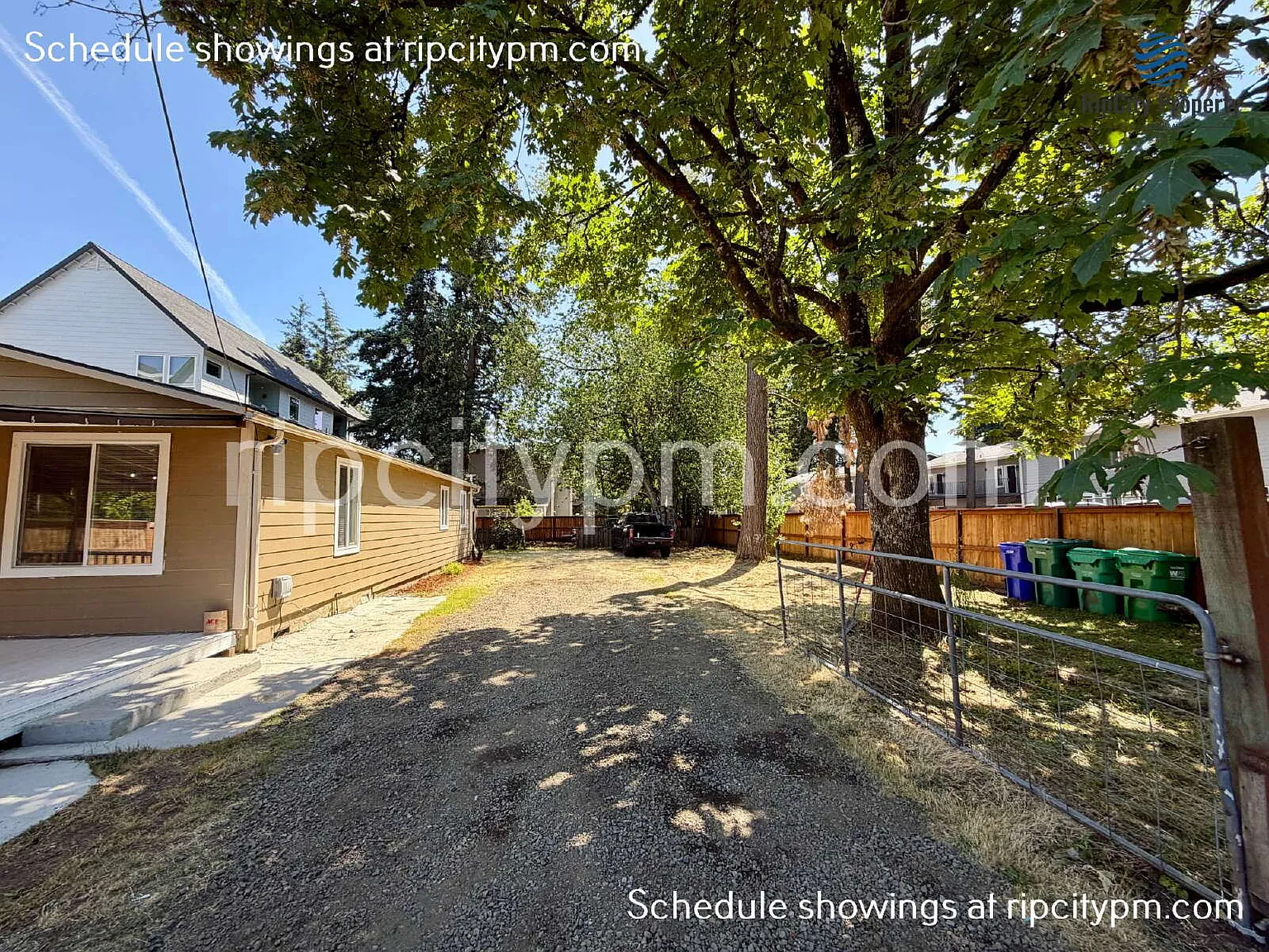 Refreshed 3 Bed Home with Expansive Gated Parking, Detached Garage & Large Yard — Photo 2
