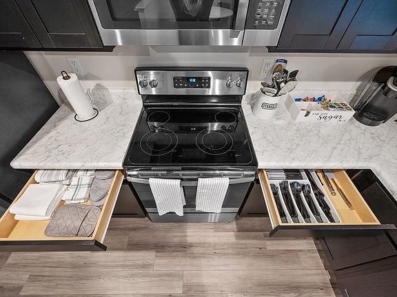 Well stock kitchen with silverware, utensils, kitchen linens, pots/pans, and all that you need for an enjoyable stay.