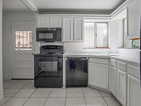 5th image of 1576 S Ogden St
