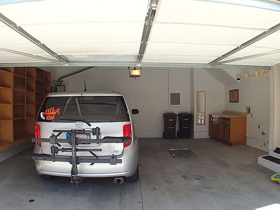 garage with room for washer, dryer and tons of storage. 2 c