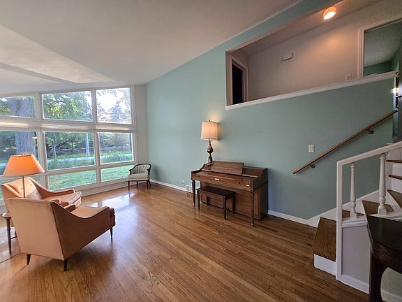 The living room facing the front window.