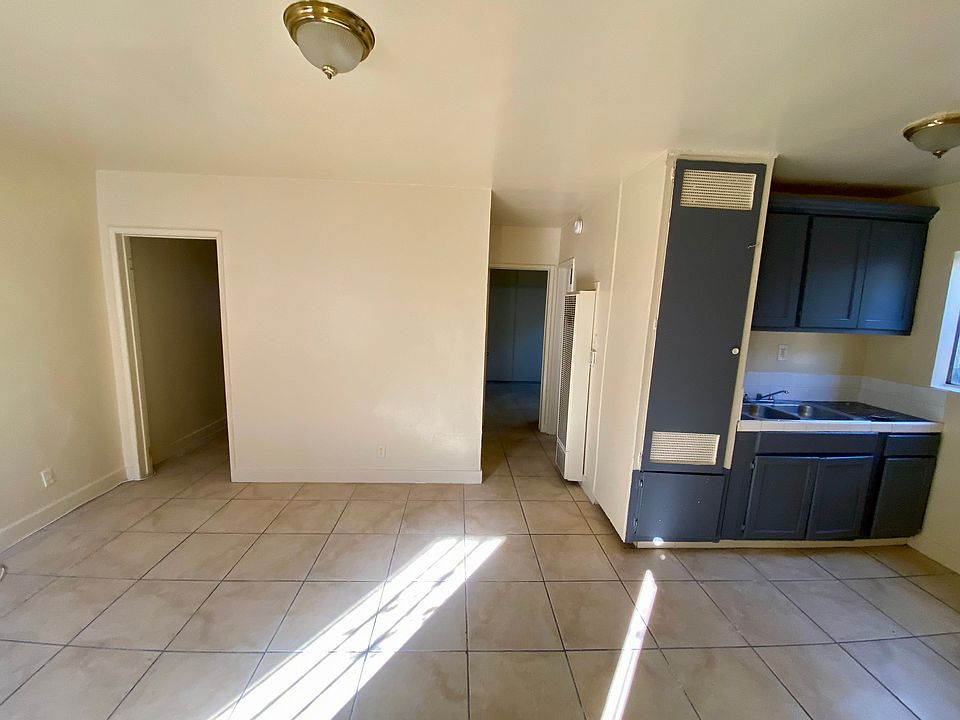 Kitchen + living/dining room area.
