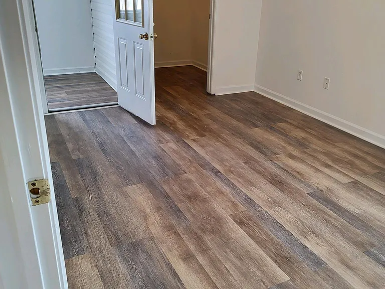 Master bedroom, walk-in closet and bonus room -- all with new hardwood flooring.