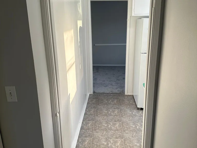 Kitchen hallway to dining area