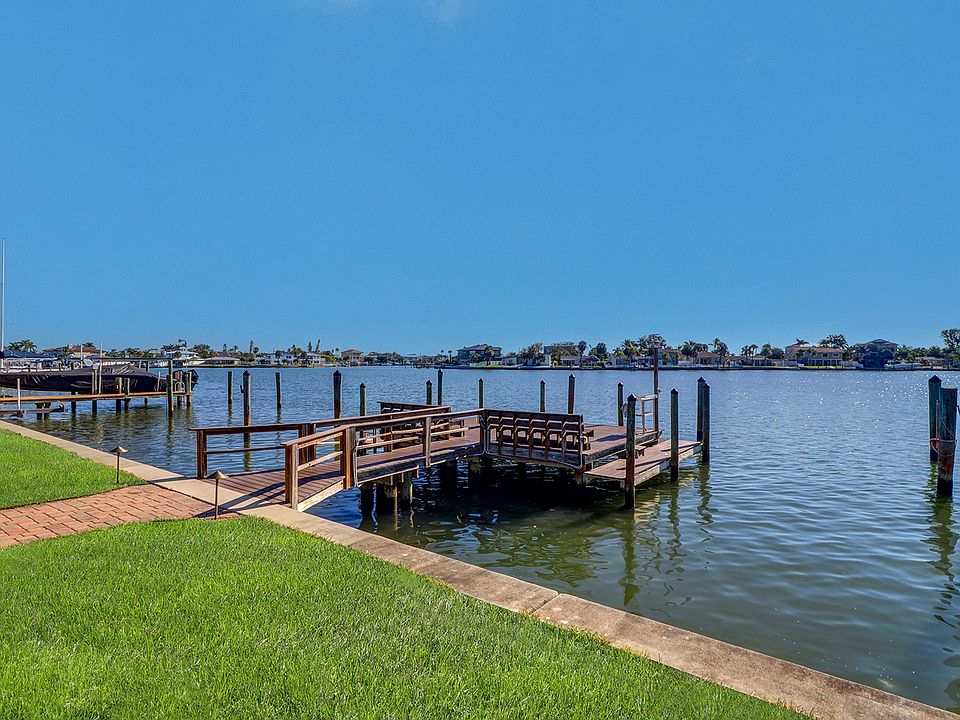 Dock has benches and retractable ladder for easy paddleboard and kayak launching