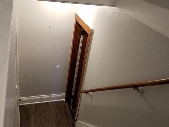 Indoor staircase up to the unit