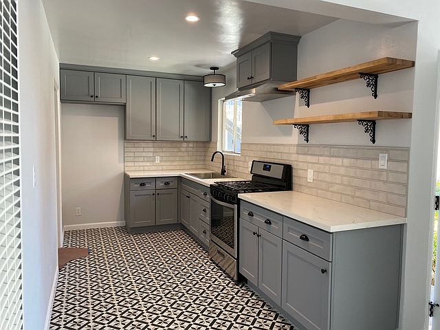Spacious kitchen with generous storage and updated farmhouse design