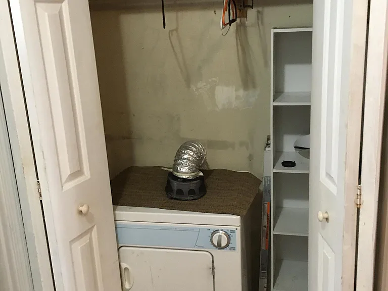 closet with dryer