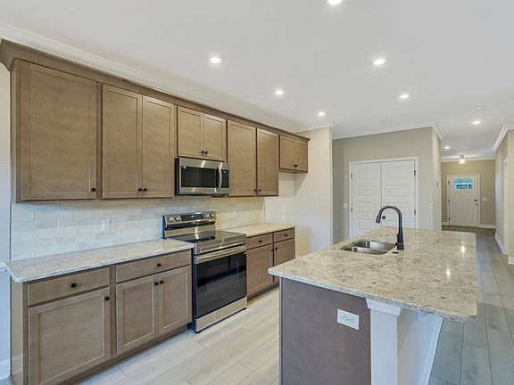 Harbor II - Kitchen with Backsplash Ernest Homes