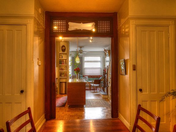 The view from the dining room into the kitchen.