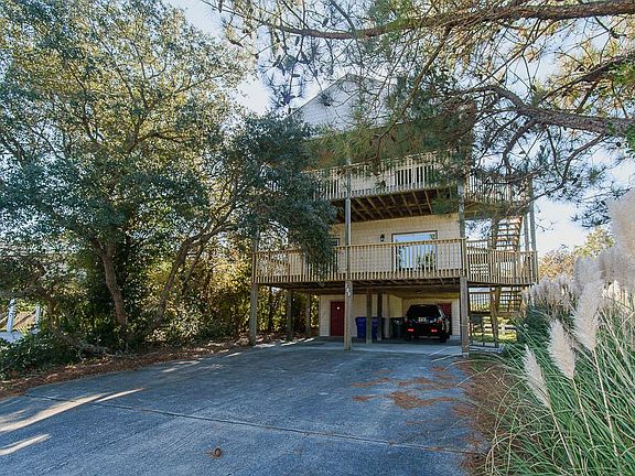 Entry is via the stairs to the right.