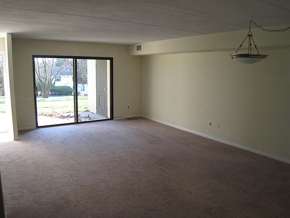 Living room with walk out patio