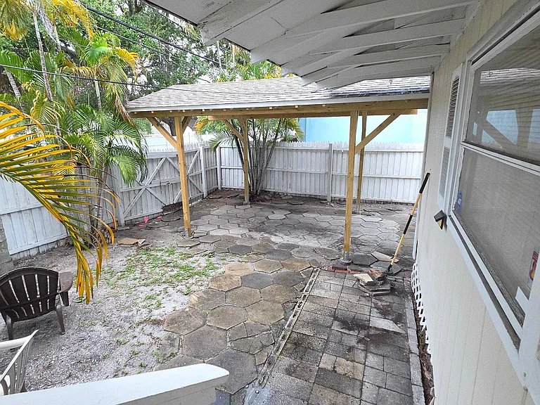 Back yard with Carport