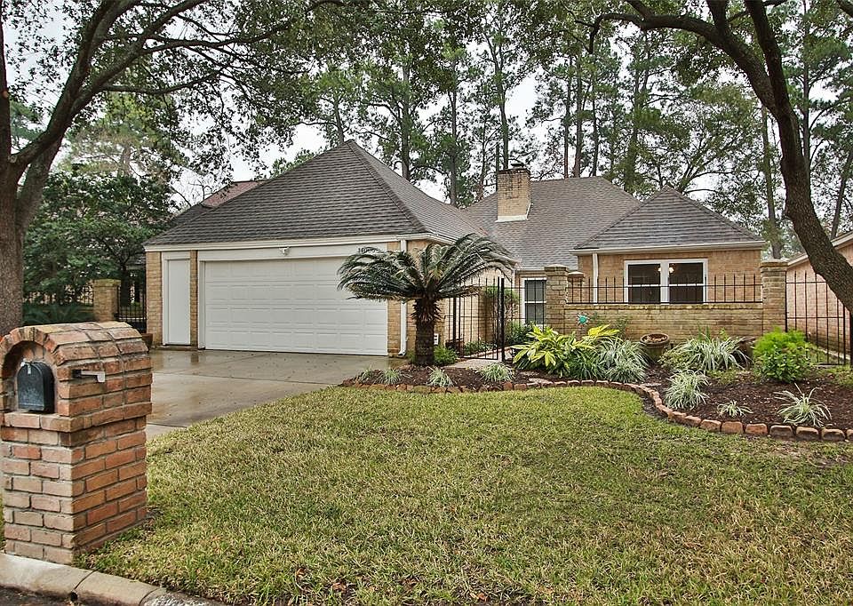 Majestic trees and pretty landscaping add to the charm of this move-in ready home.
