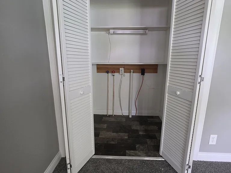 Washer Dryer Hook-up closet. It's very deep and can easily have a stackable unit turned on the side.